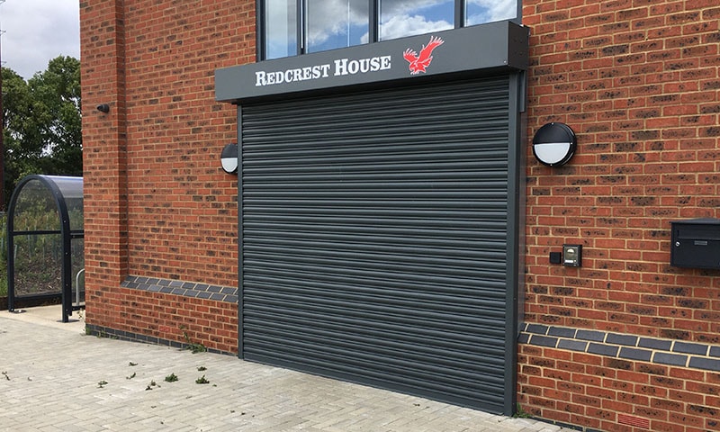Modern industrial roller shutter door on commercial building