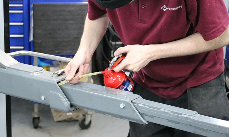 Technician servicing equipment