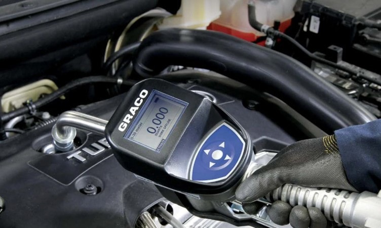Graco fluid dispensing system installed in workshop
