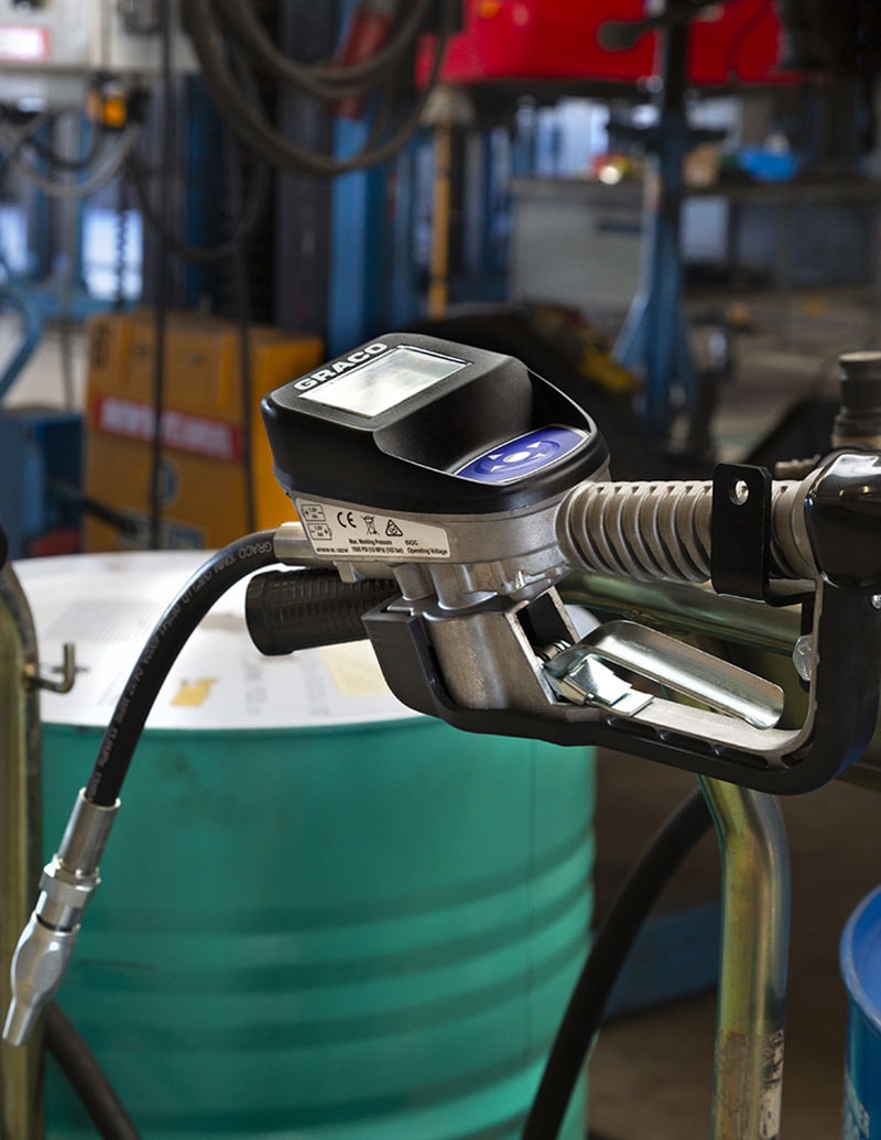 Ceiling mounted hose reel oil dispenser