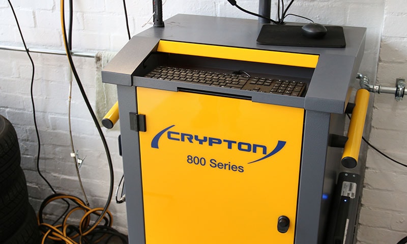 Vehicle exhaust emissions gas analyser in a workshop